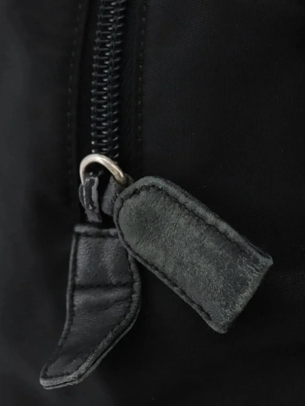 Prada brand	prada color	black